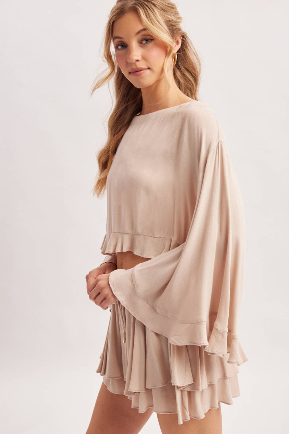 BILLOWY CROPPED OVERSIZED BELL SLEEVE RUFFLE HEM TOP: BIRCH