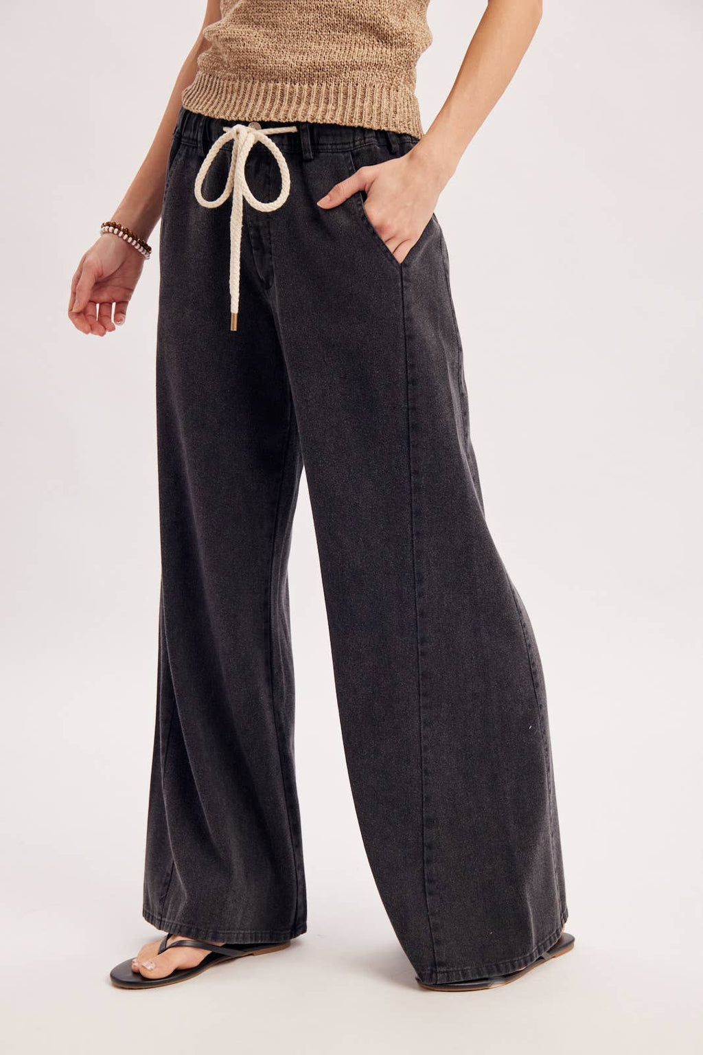 RELAXED MID-RISE FLARE KNIT PANTS