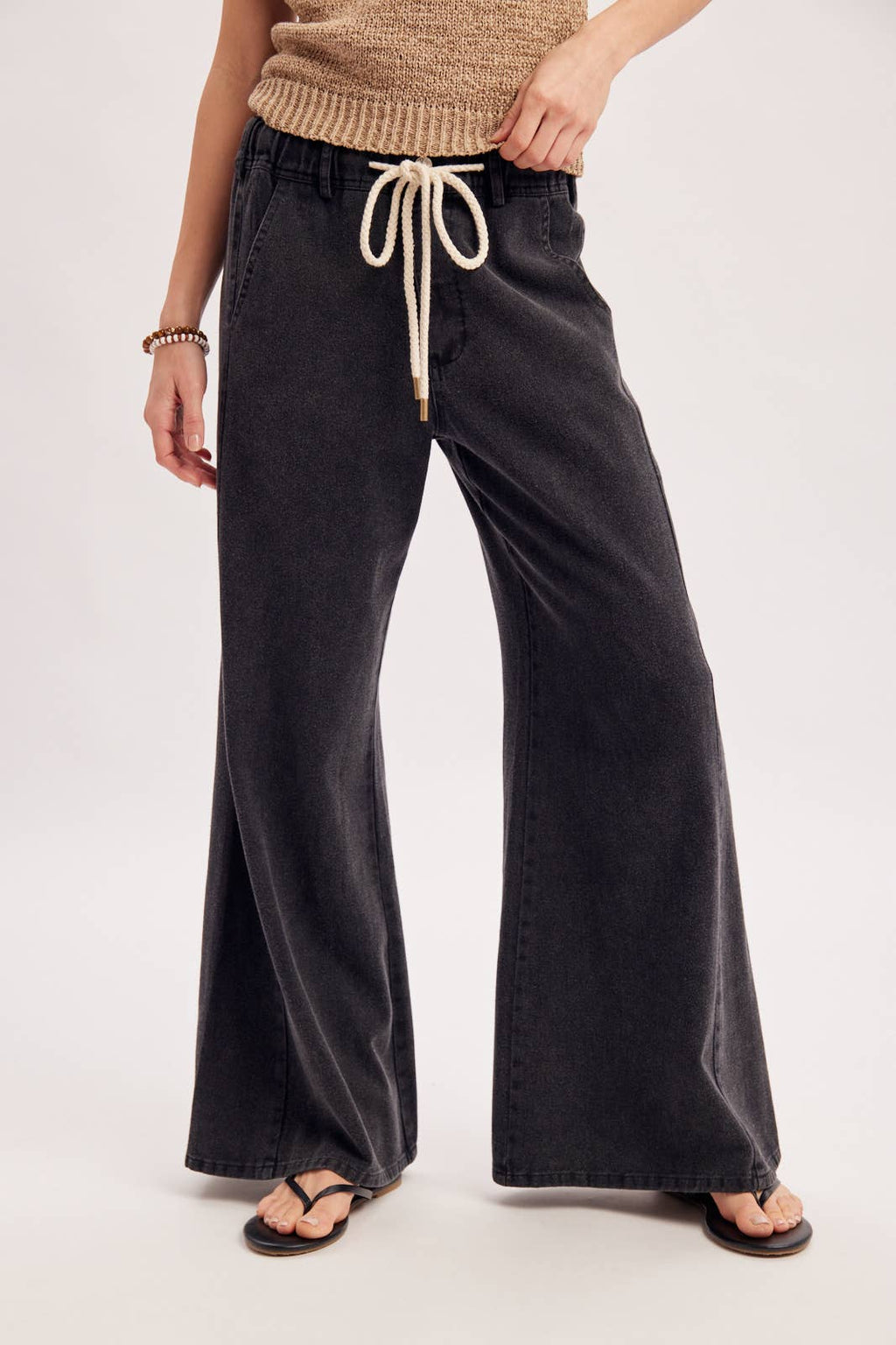 RELAXED MID-RISE FLARE KNIT PANTS
