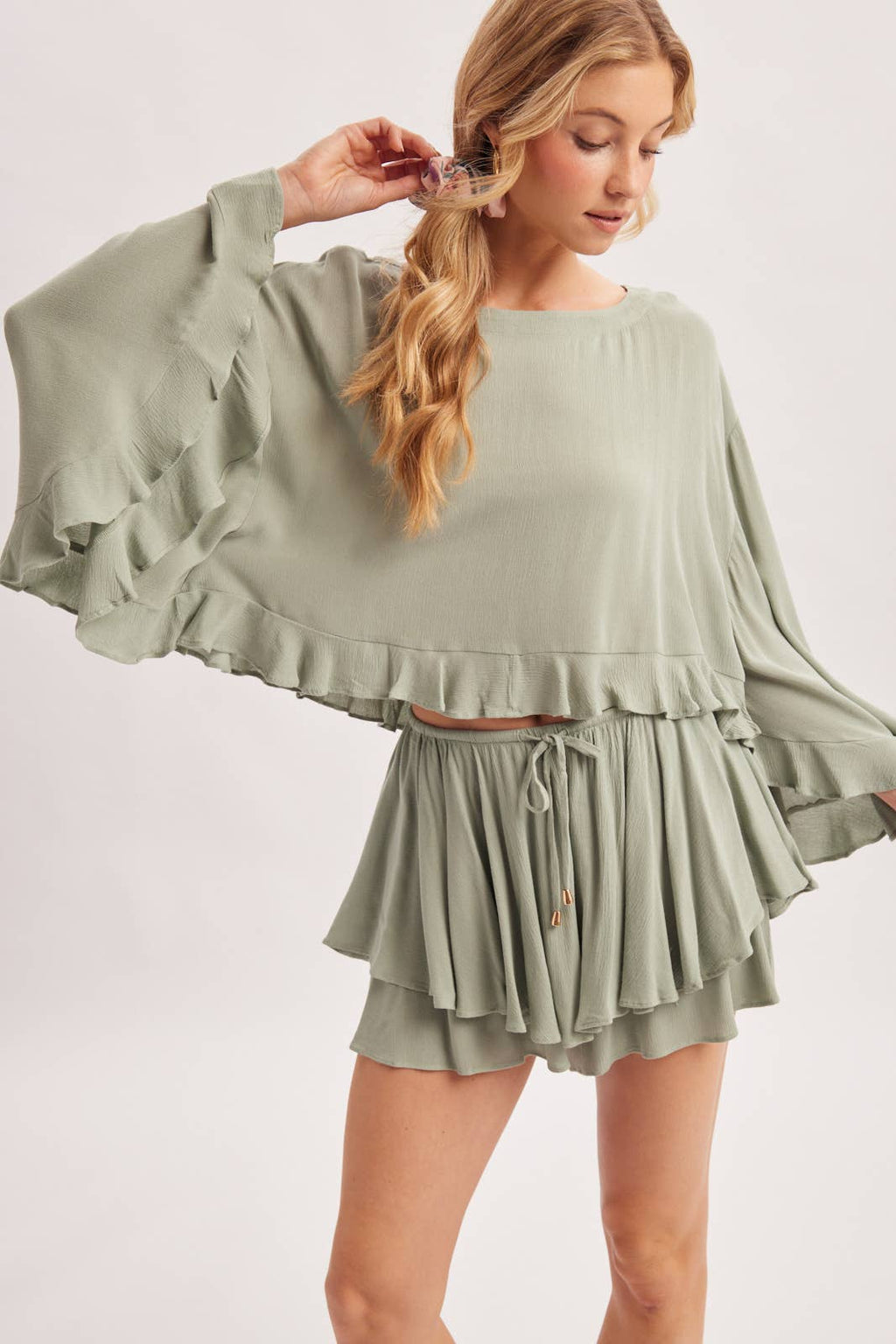 BILLOWY CROPPED OVERSIZED BELL SLEEVE RUFFLE HEM TOP: BIRCH