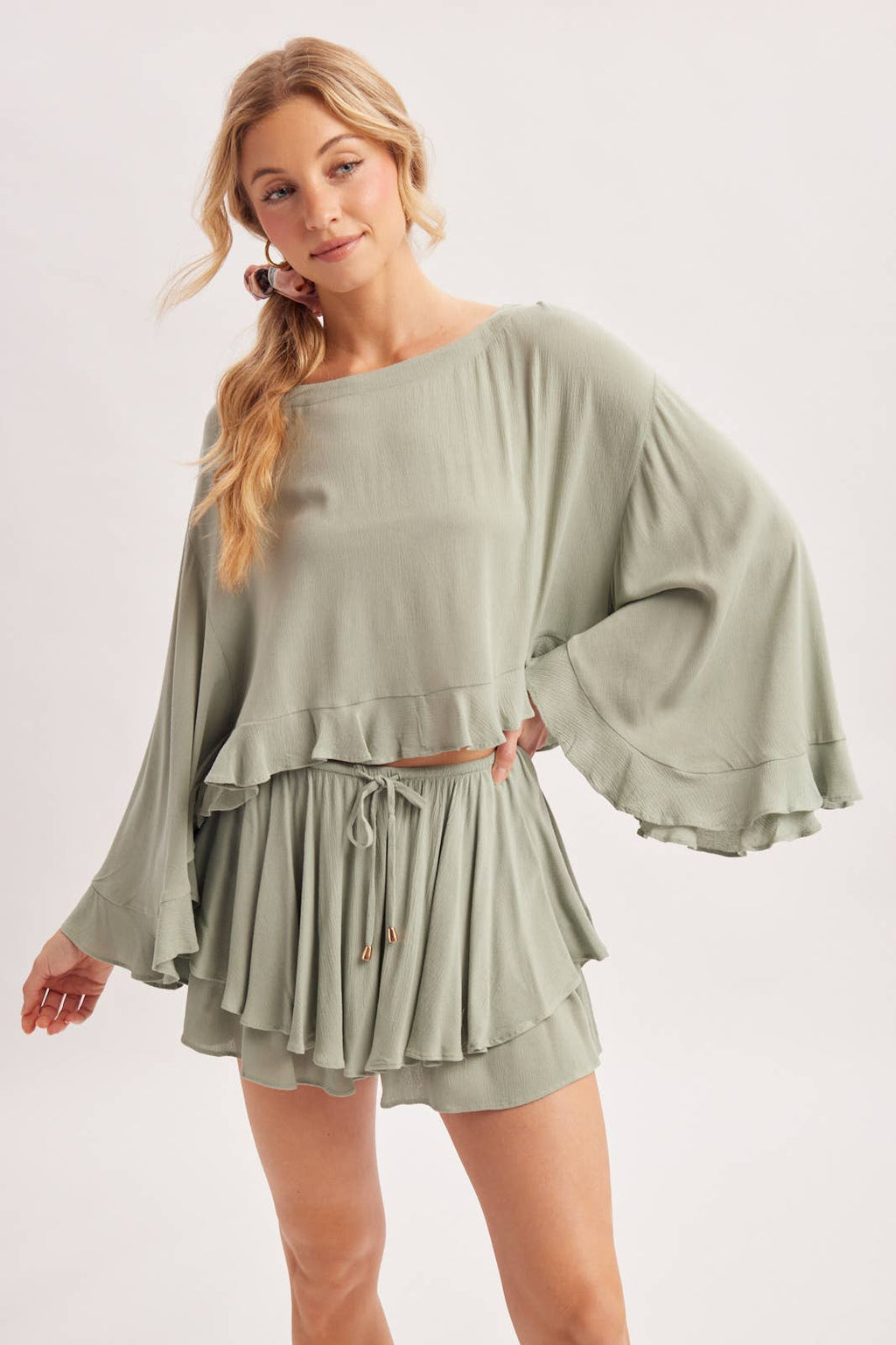 BILLOWY CROPPED OVERSIZED BELL SLEEVE RUFFLE HEM TOP: BIRCH