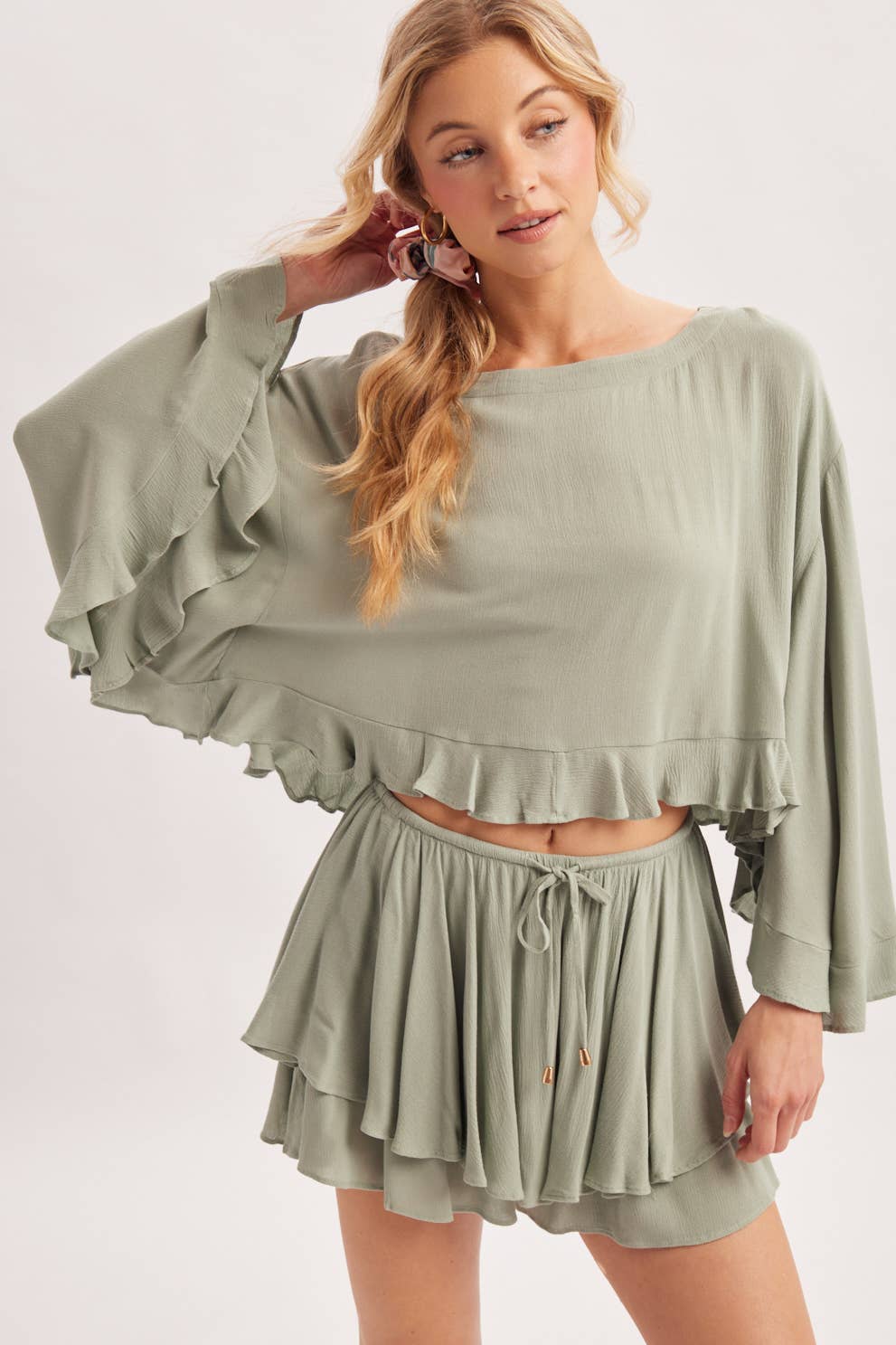 BILLOWY CROPPED OVERSIZED BELL SLEEVE RUFFLE HEM TOP: BIRCH