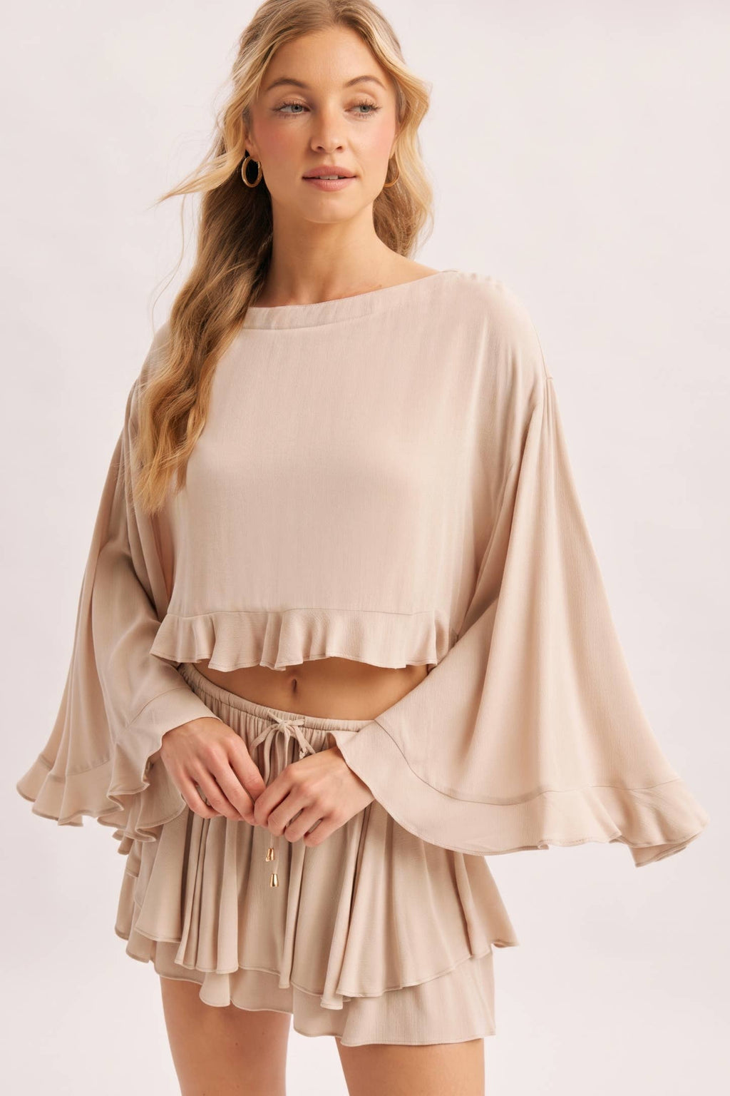 BILLOWY CROPPED OVERSIZED BELL SLEEVE RUFFLE HEM TOP: BIRCH