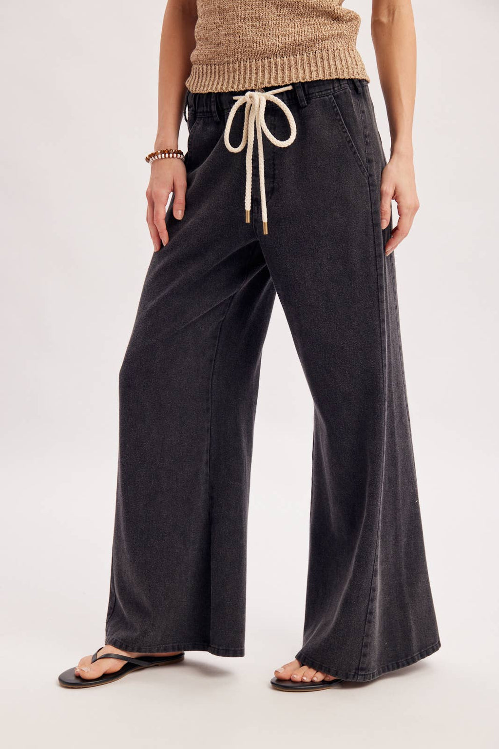 RELAXED MID-RISE FLARE KNIT PANTS