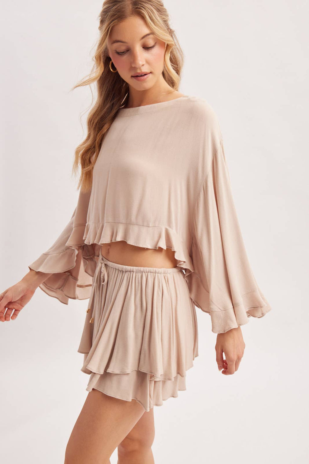 BILLOWY CROPPED OVERSIZED BELL SLEEVE RUFFLE HEM TOP: BIRCH