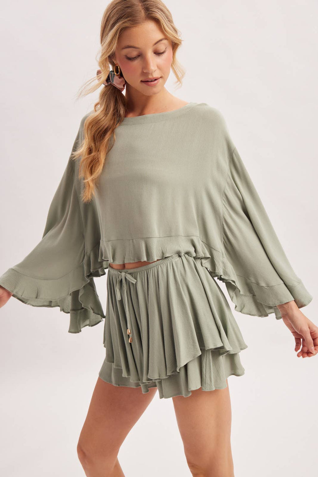 BILLOWY CROPPED OVERSIZED BELL SLEEVE RUFFLE HEM TOP: BIRCH